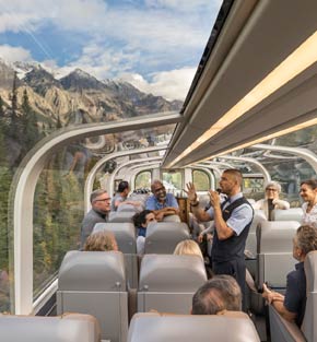 A host telling stories aboard Rocky Mountaineer A host telling stories aboard Rocky Mountaineer