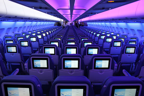 A row of empty seats on an Air Transat plane ready to board