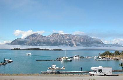 Stunning lakeside view of a rental RV